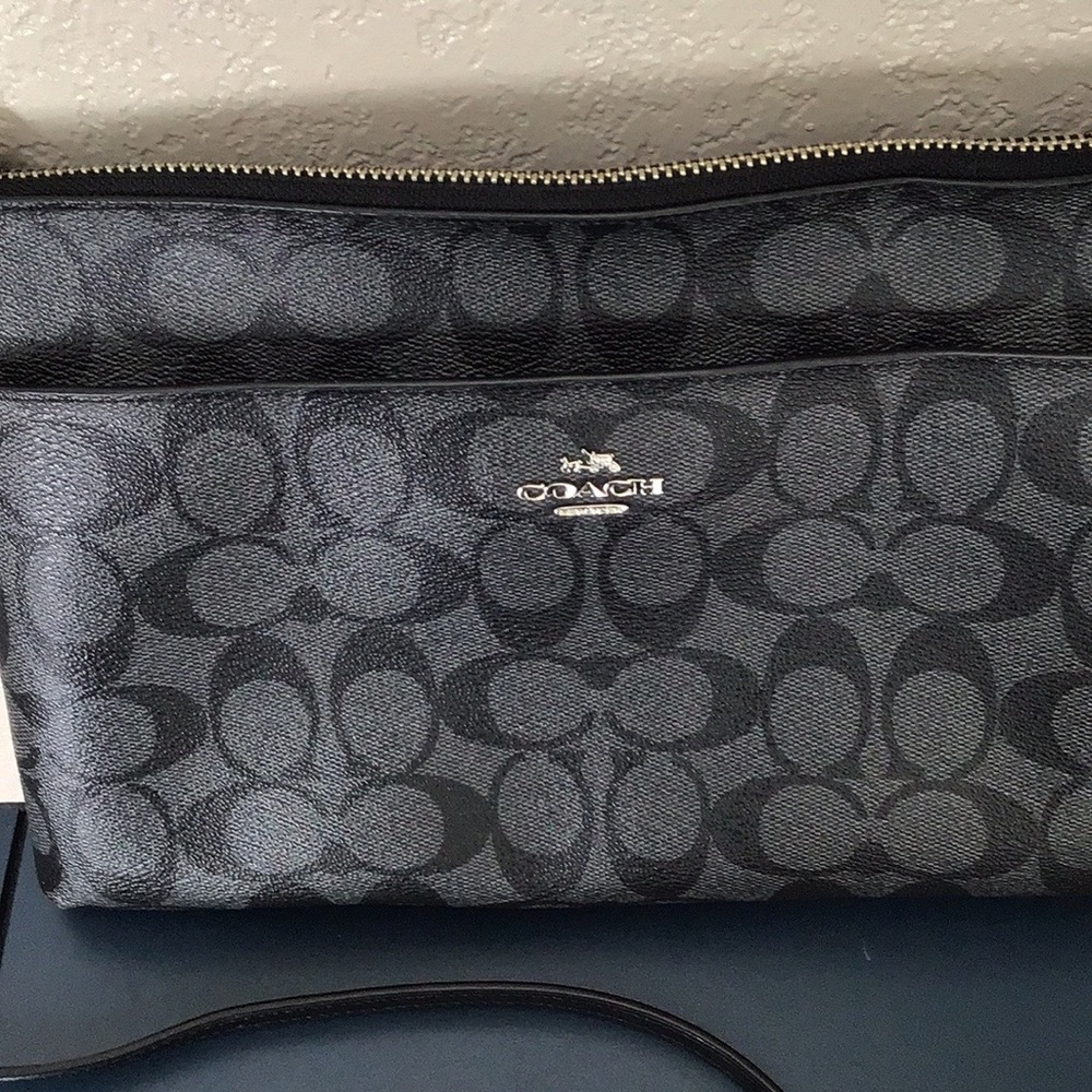 Like new Coach east west logo leather crossbody